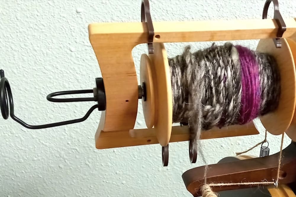 A yarn spinner in The Knitter’s Nook turns clumps of fibers into longer, stronger, shapeable strings. (Edmond Ortiz/Community Impact)