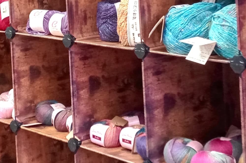 The Knitter’s Nook offers a variety of yarn from brands such as Juniper Moon Farm, Noro and Aracaunia. (Edmond Ortiz/Community Impact)