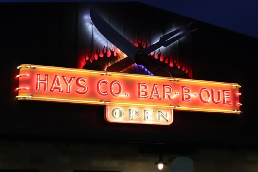 Jay Gordon's team created the fiery sign for Hays Co. BBQ. (Zara Flores/Community Impact)