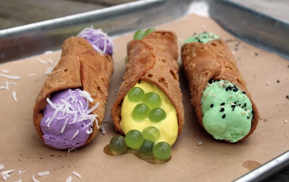 Farm Feed offers cannolis with ube/coconut, pandan/sesame or passion fruit/kiwi boba filling. (Karen Chaney/Community Impact)