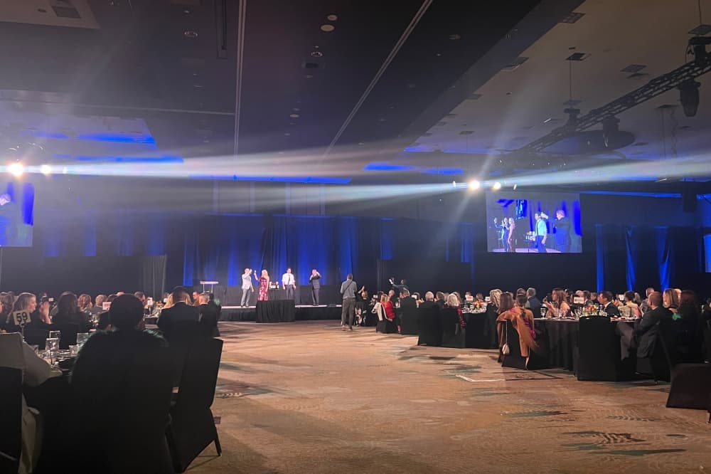 Crowd and stage at the gala