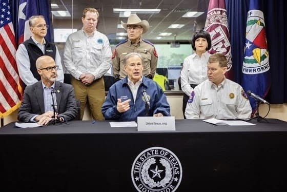 State leaders urge residents to stay off roadways as winter storm pummels Texas