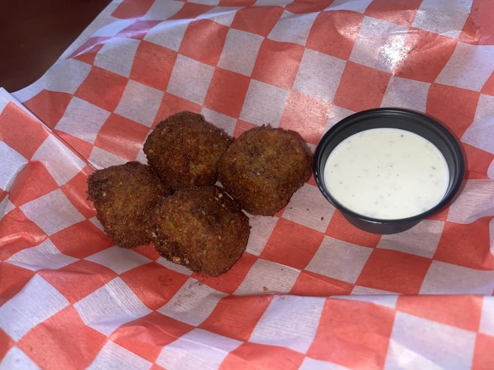 
Boudin balls ($7.95) are rice rolled into sausage balls, tossed with panko and deep-fried.