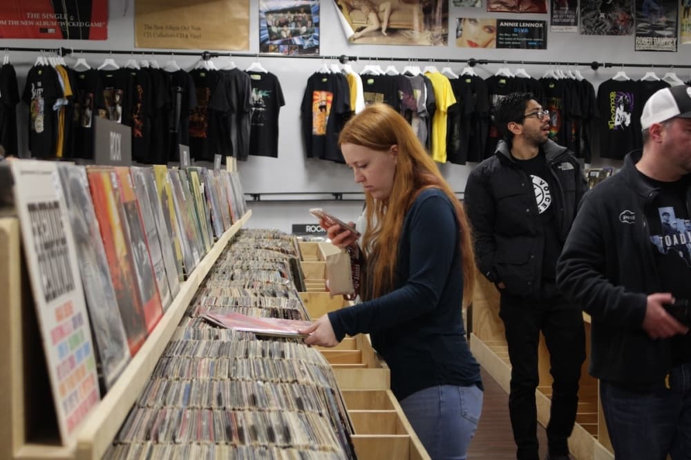 Customer shops at Josey Records in Plano