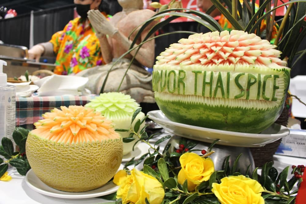 ZapVor by Thai Spice, located on Sawdust Road, displayed handcarved melons at its table. (Jessica Shorten/Community Impact)