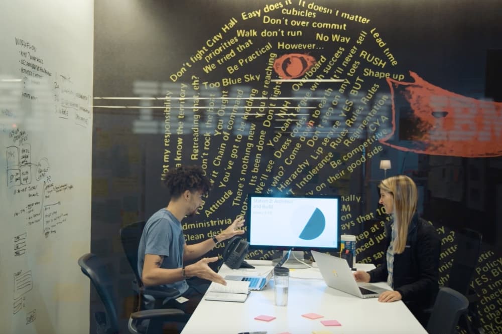 Man and woman working with a computer