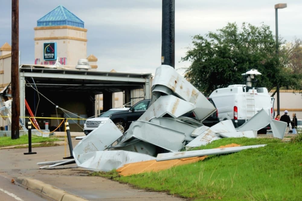 a pile of debris after a storm. 