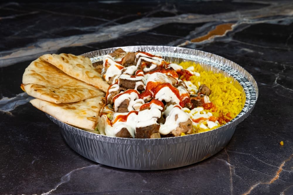 The menu also includes various gyro wraps, homemade onion rings, wings, a fried burrito, mac and cheese balls, and milkshakes. (Courtesy Genend Digital)