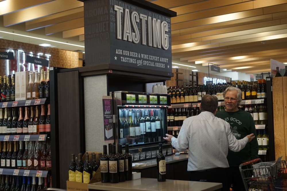 The store has an expansive beer and wine selection with a tasting station. (Katy McAfee/Community Impact)