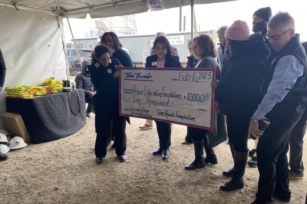 A check for $10,000 was presented to Frisco ISD and Frisco Education Foundation members from the Tom Thumb Foundation to acknowledge the work they do for Frisco students. (Alex Reece/Community Impact)