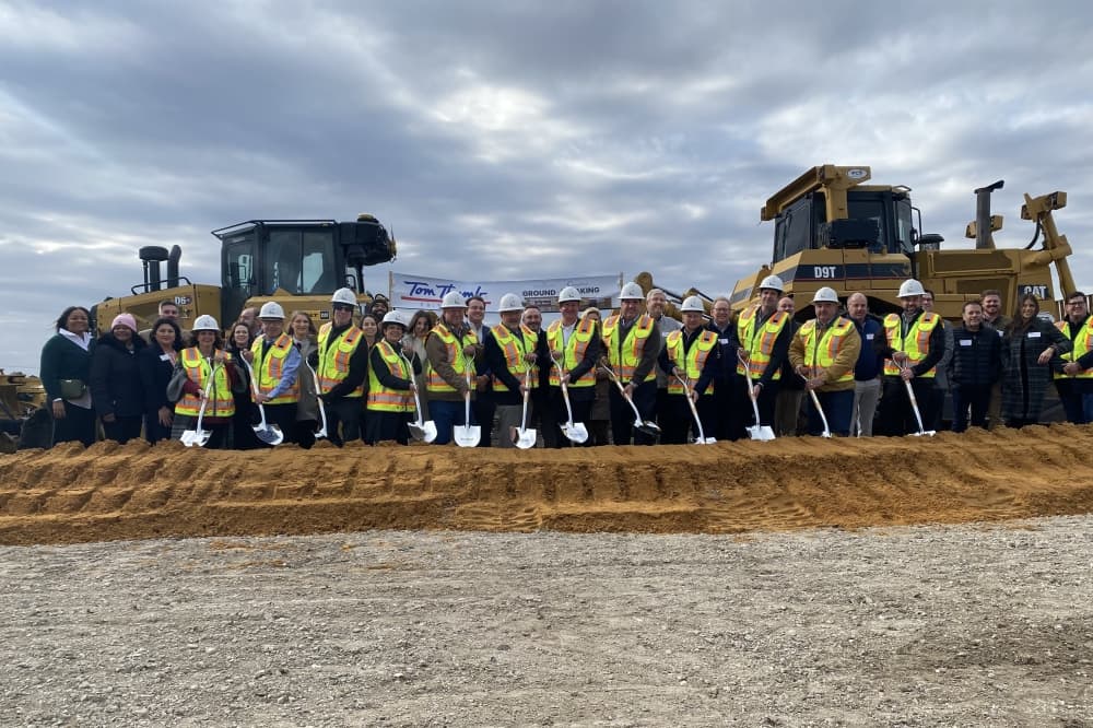 All attendees and representatives were invited to take part in the traditional breaking ground event with custom Tom Thumb shovels. (Alex Reece/Community Impact) 