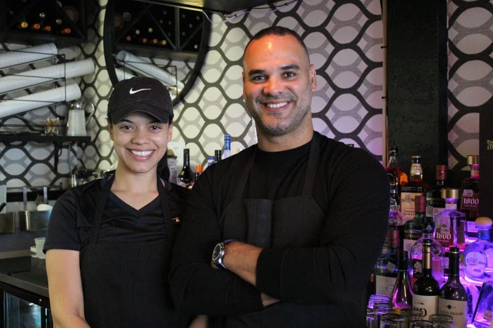 Co-owners Julissa Gonzalez and Jarlis Lugo run Punta Cana Caribbean Restaurant. (Emily Lincke/Community Impact)