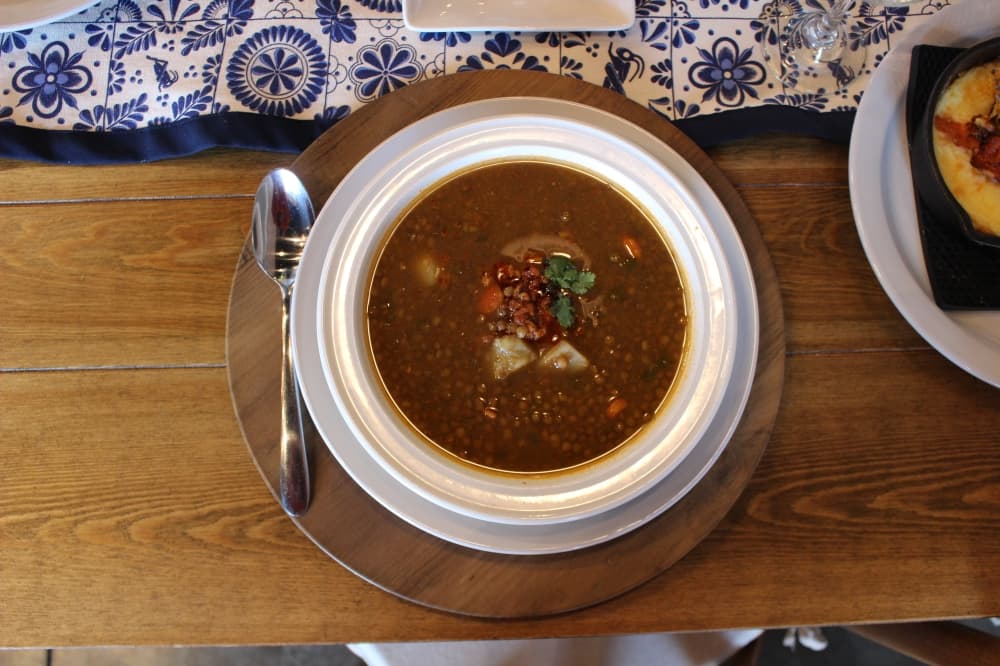 Sopa de lentejas (cup $6.50, entree $16.00) is a vegetarian lentil soup.(Kylee Haueter/Community Impact)