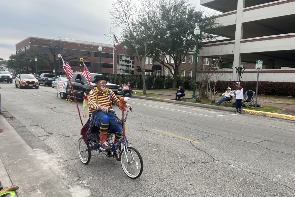 One float called Cheerful Clowns also featured clowns walking or riding bicycles. (Peyton MacKenzie/Community Impact)