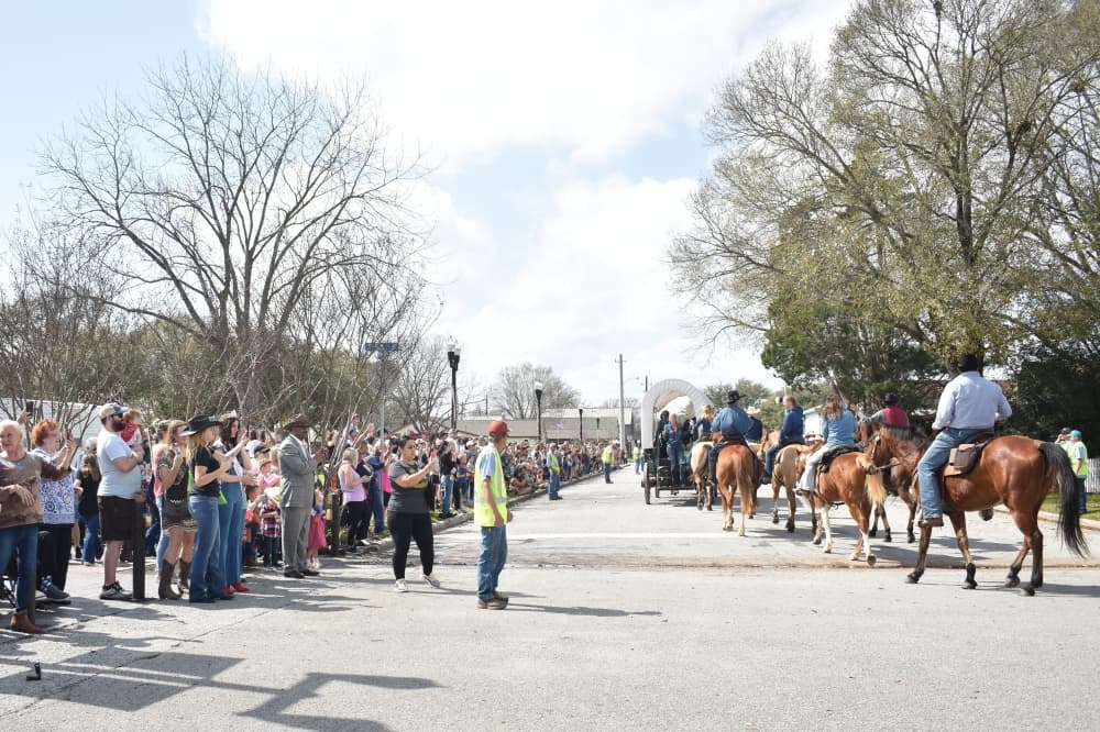 The Sam Houston Trail Riders galloped into Tomball on Feb. 20 as they made their way to the Houston Livestock Show and Rodeo. (Lizzy Spangler/Community Impact)