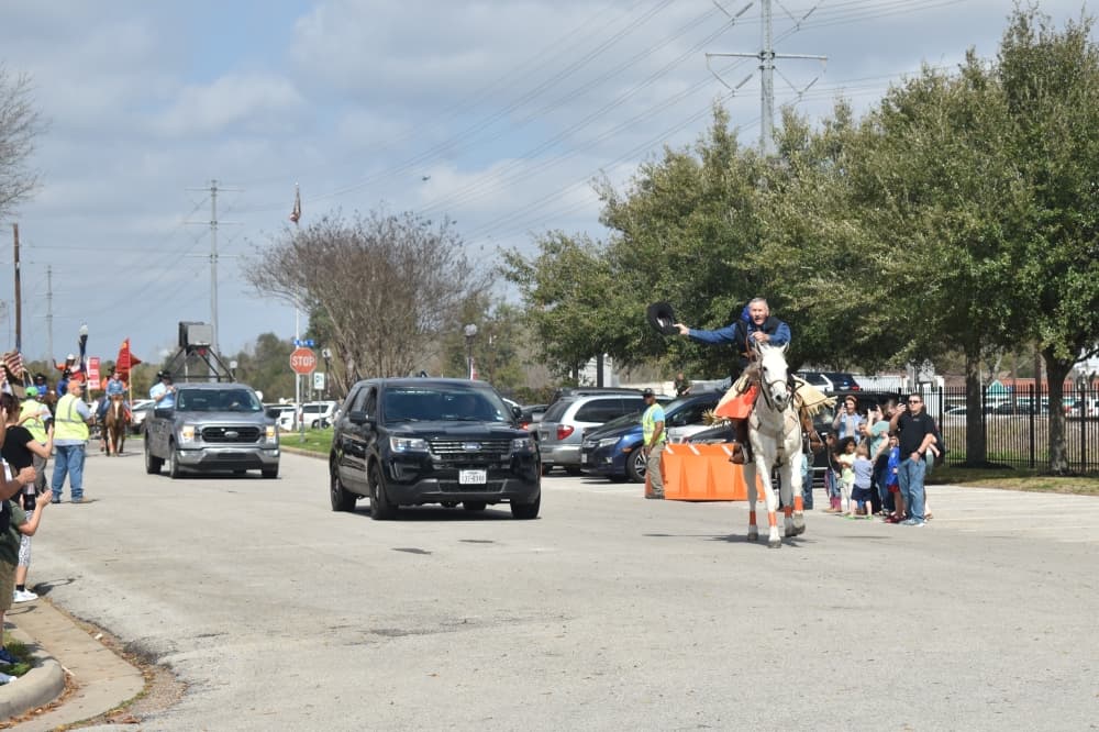 The Tomball Depot Plaza is just one stop the trail riders make on their 70-mile journey to the Houston Livestock Show and Rodeo. (Lizzy Spangler/Community Impact)