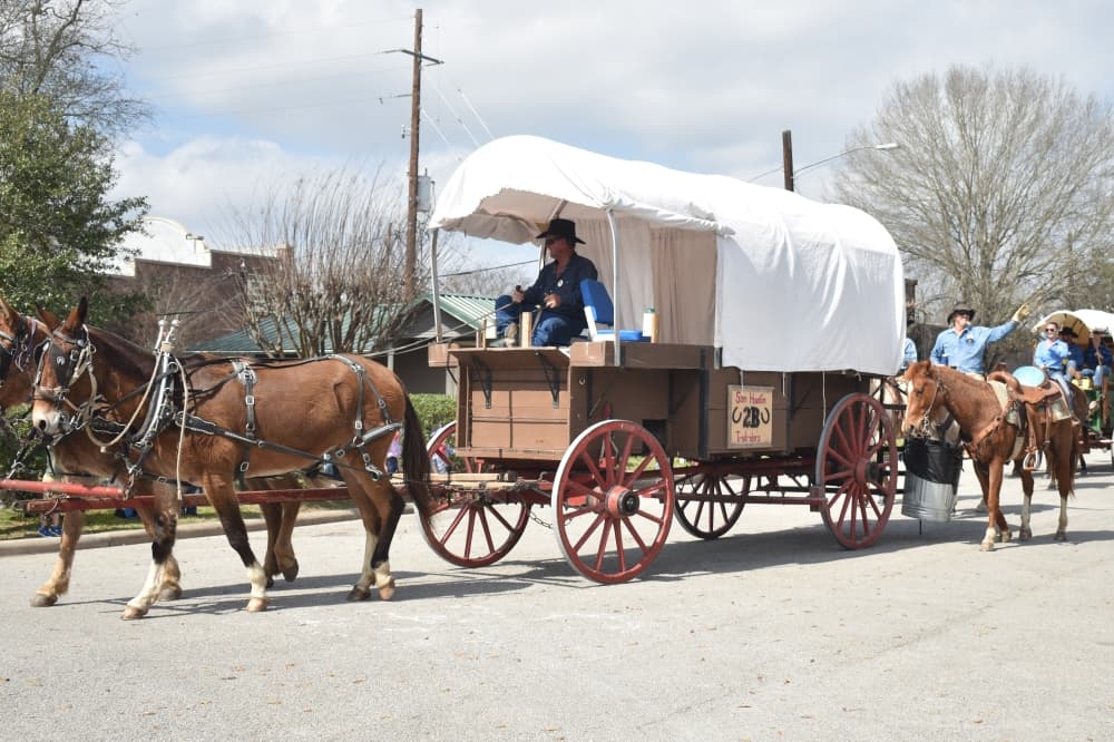 The Sam Houston Trail Riders galloped into Tomball on Feb. 20 as they made their way to the Houston Livestock Show and Rodeo. (Lizzy Spangler/Community Impact)