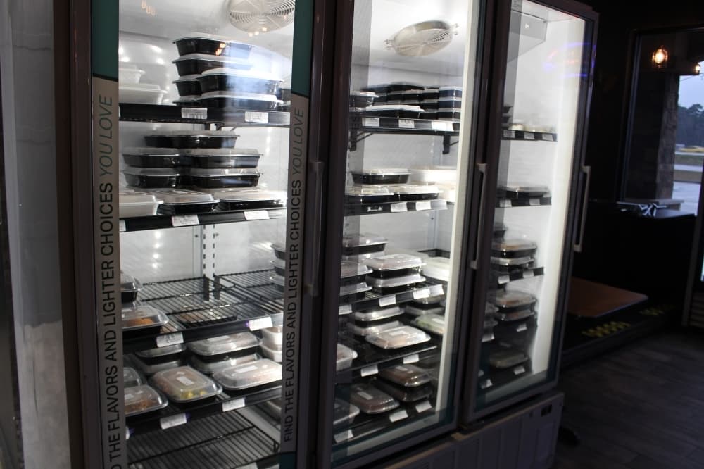 Meals are prepared fresh weekly and kept refrigerated for clients to come in and purchase. After a few days, the unsold meals are frozen for future sell. (Jessica Shorten/Community Impact)