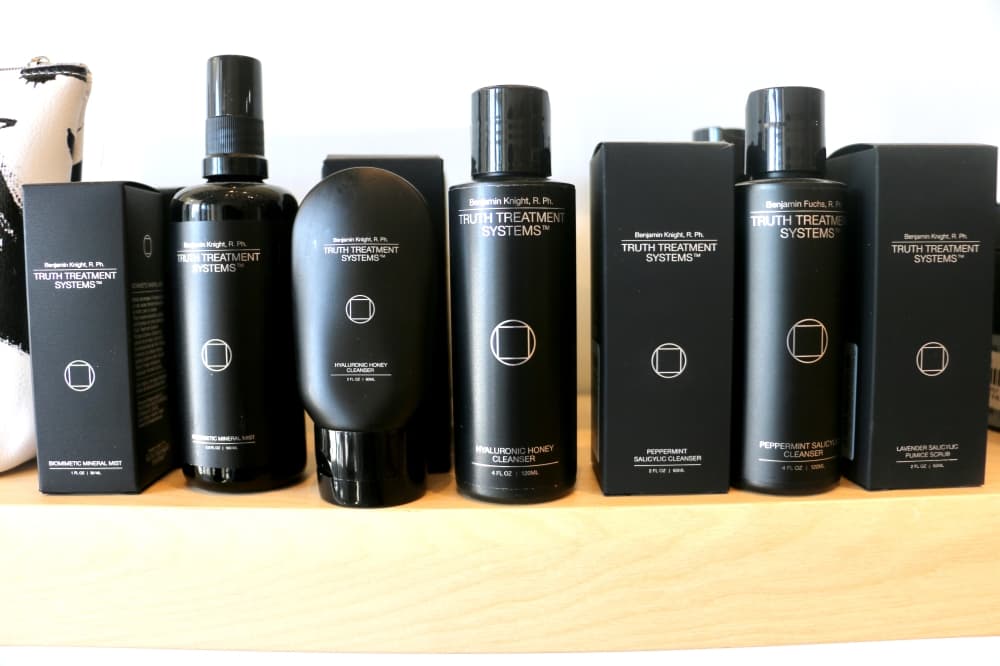 the health and beauty products sit in a line 