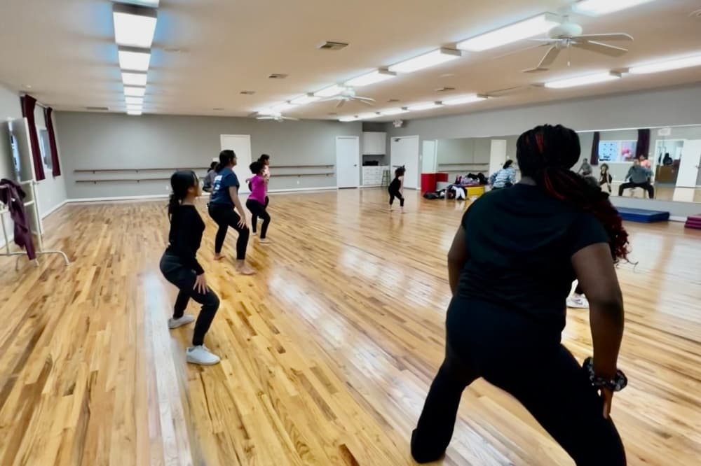 students participate in a dance class 