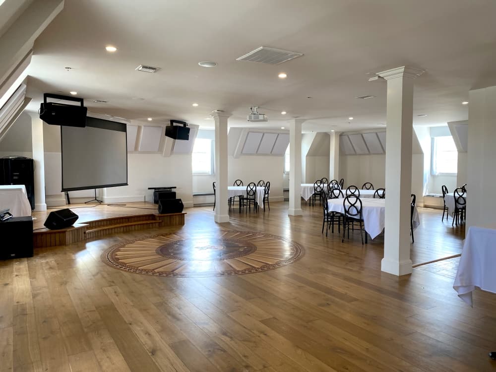 event hall with wooden floors and white ceilings 