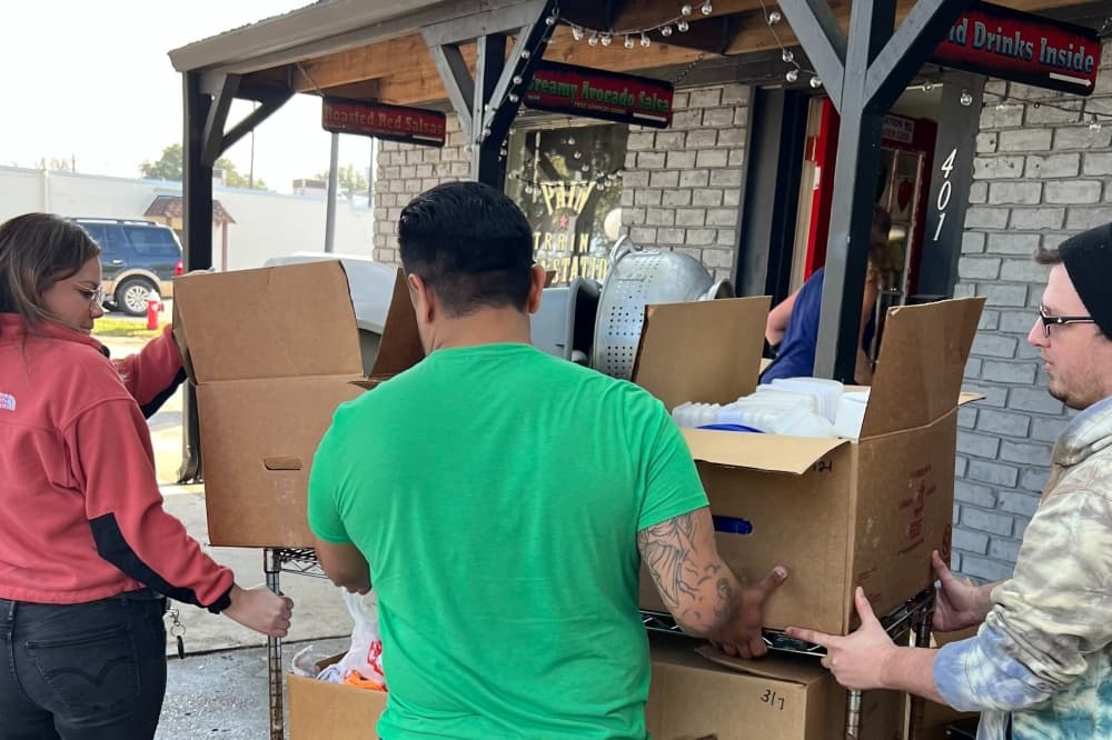 Employees from The Woodlands Whole Foods came out to help Pain Train Salsa move into its new location. (Courtesy Pain Train Salsa)