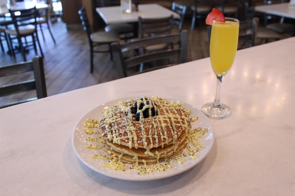 The Lemon Berry Poppyseed pancakes are made with lemon curd, blueberries and poppy seeds. 