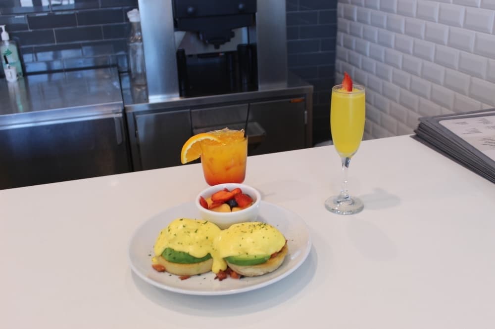 The California Benny is an English muffin with avocado, bacon, tomato, poached eggs and Hollandaise. 