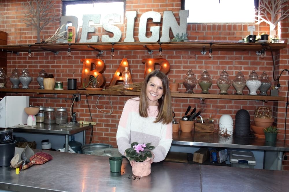 Dawna Schmidt bought Redenta’s Garden Shop in April 2022. The business was established in 1992 by Ruth Kinler, who named the shop after her Aunt Redenta. (Karen Chaney/Community Impact)