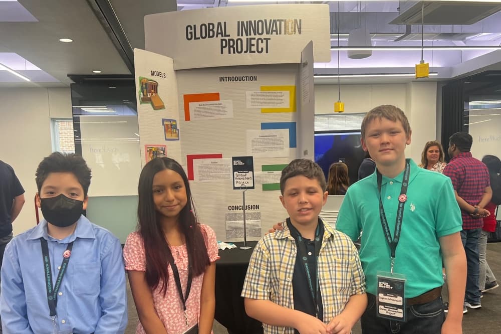 A group of Cooper Elementary 5th grade Gifted & Talented students presented their "Global Innovation Project." (Tekima Johnson/Community Impact)