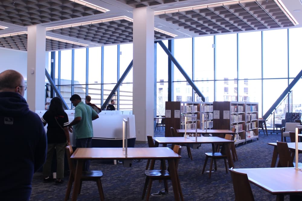 A quiet study area is located in the corner of the second floor, filled with artwork from local artists and one entrance to the terrace. (Alex Reece/Community Impact)