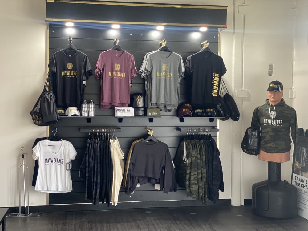 Wall of clothes racks
