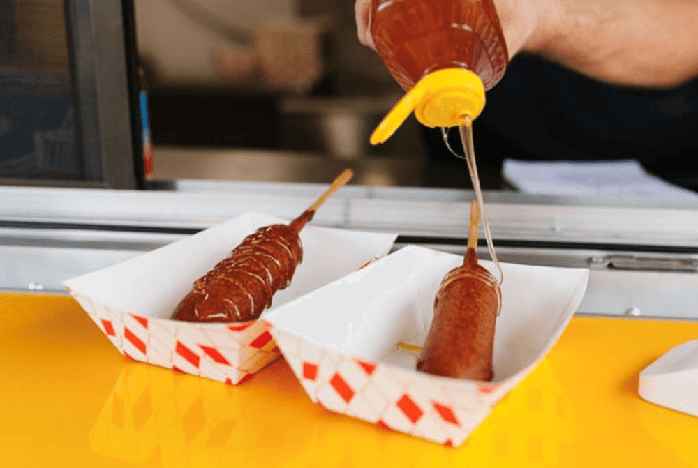 The Corndog Co ATX serves hand-dipped, honey-glazed corn dogs at South Austin Beer Garden