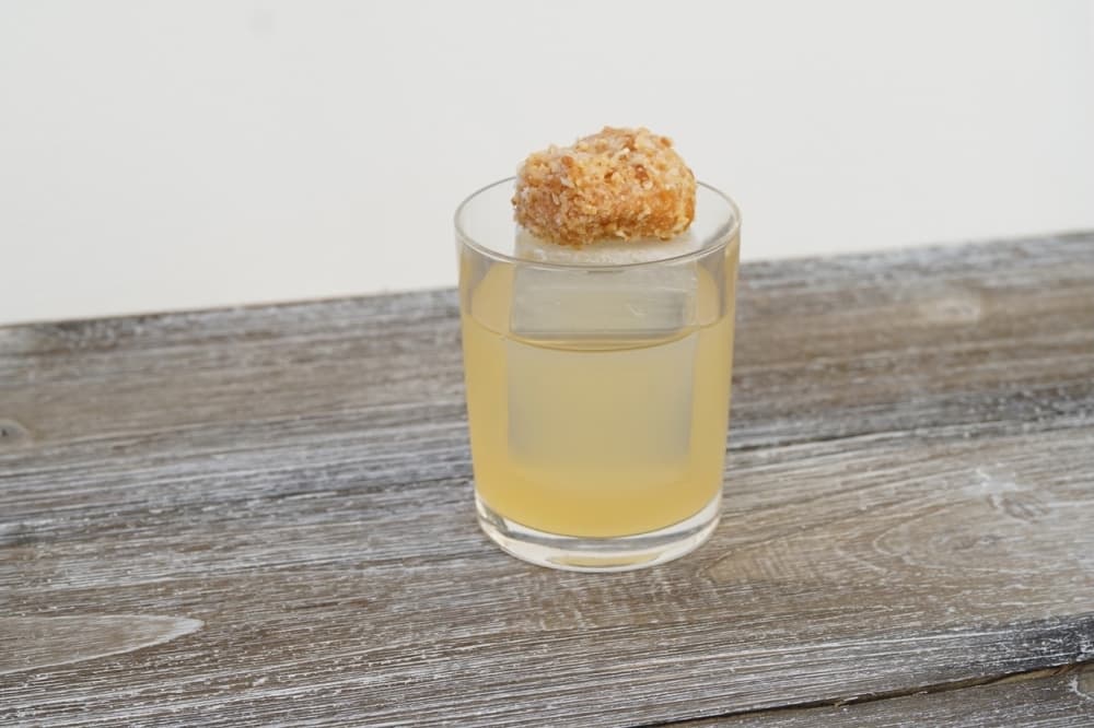 "The Montréal" is one of several globally-inspired cocktails served at PS21 and is made with rye whiskey, Yellow Chartreuse and maple syrup, garnished with a mini donut. (Courtesy PS21)