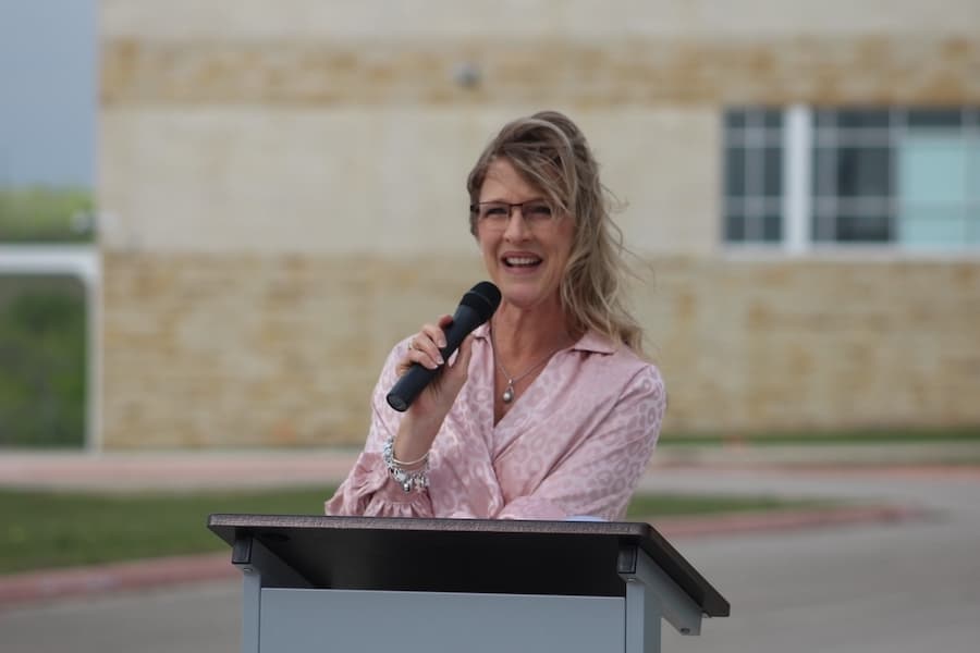 Kara Boch, NBISD's acting superintendent, speaks at the Long Creek High School groundbreaking ceremony. (Amira Van Leeuwen/Community Impact)