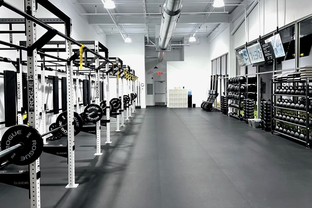 Gym space with weight racks and weights
