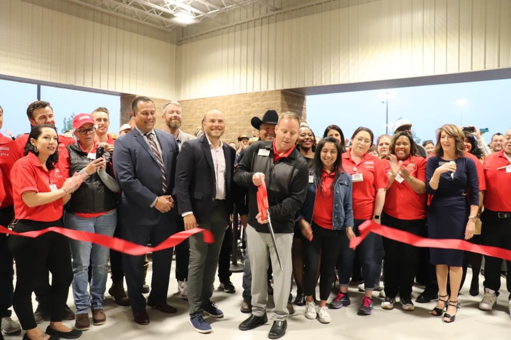 City of Kyle and Hays County officials, and Costco leadership and employees held a ribbon-cutting ceremony for the new store. (Zara Flores/Community Impact)