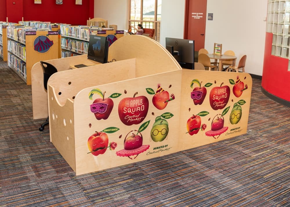 New workstations at Plano's Haggard Library allow caregivers to work alongside children