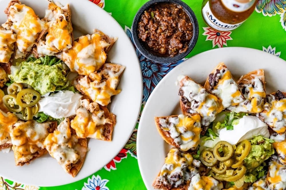 Food options include Chicken or Beef Nachos