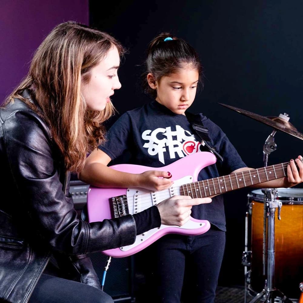 Kids playing instruments. 