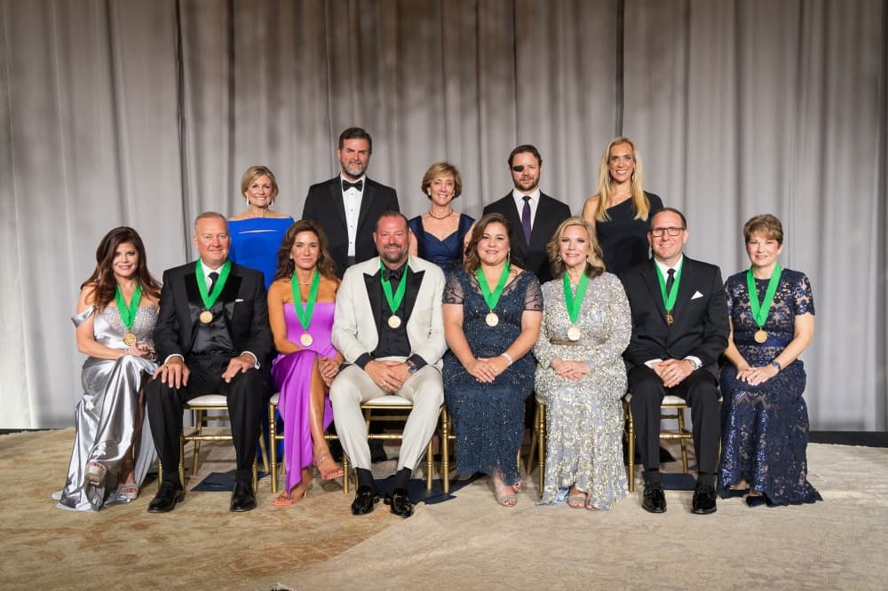 Interfaith of The Woodlands gala Hometown Heroes are in the front row  from left to right