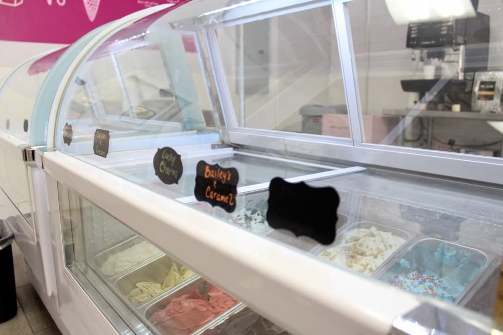 View of gelato in the freezer case with flavor labels