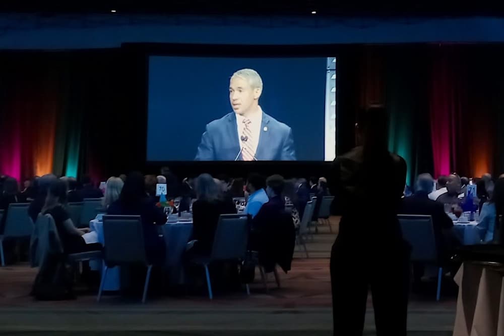 Attendees of San Antonio Mayor Ron Nirenberg’s State of the City address watch him on a big screen at the April 11 event at the Henry B. Gonzalez Convention Center. (Edmond Ortiz/Community Impact)

