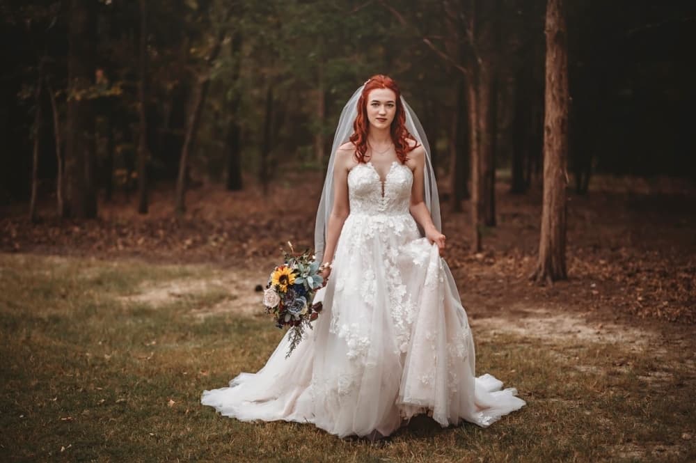 A woman wearing a wedding dress