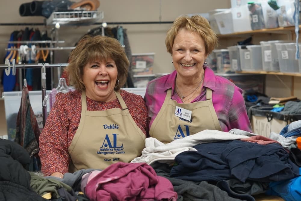 Nancy Glasgow, right, and Debbie, sort through donations at the thrift shop. (Cassandra Jenkins/Community Impact)