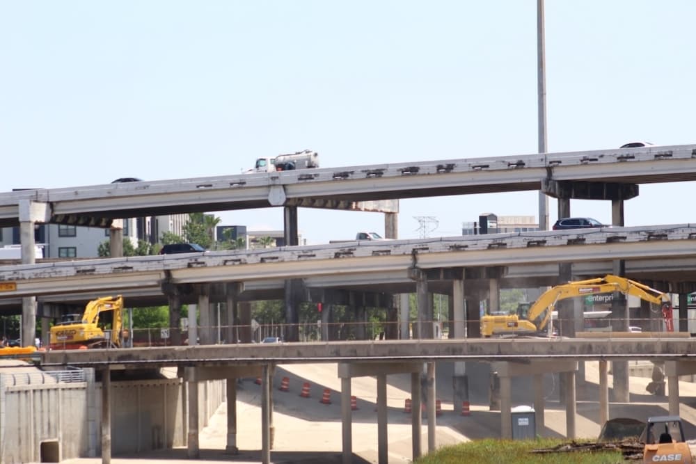 Construction crews work on bridge construction
