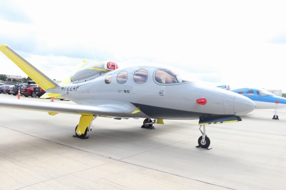 Grey and yellow Cirrus Vision Jet