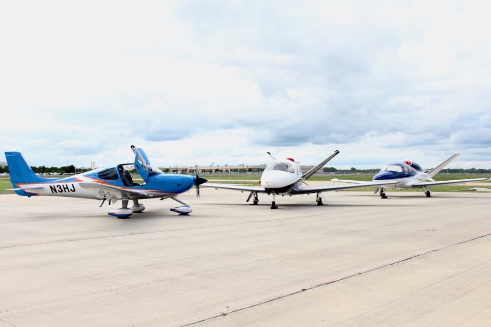 three personal-sized planes