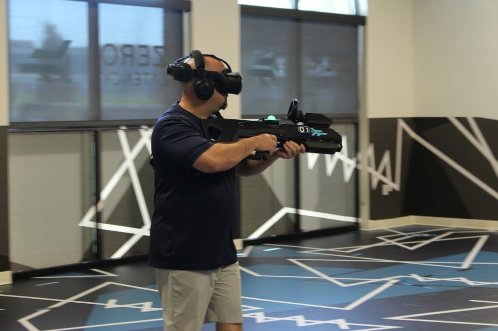 jason wright aims his vr gun