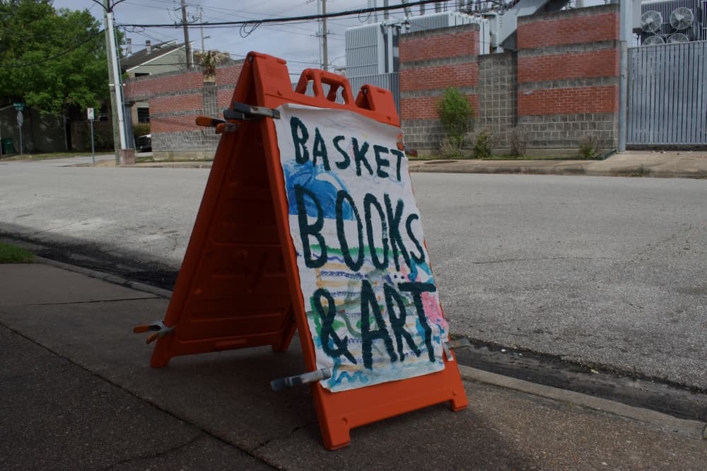 Sign that says Basket Books & Art